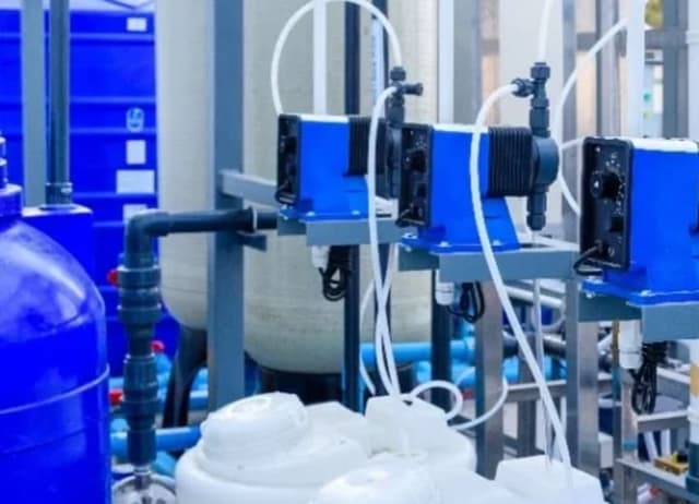 Equipment for water treatment chemicals in a facility