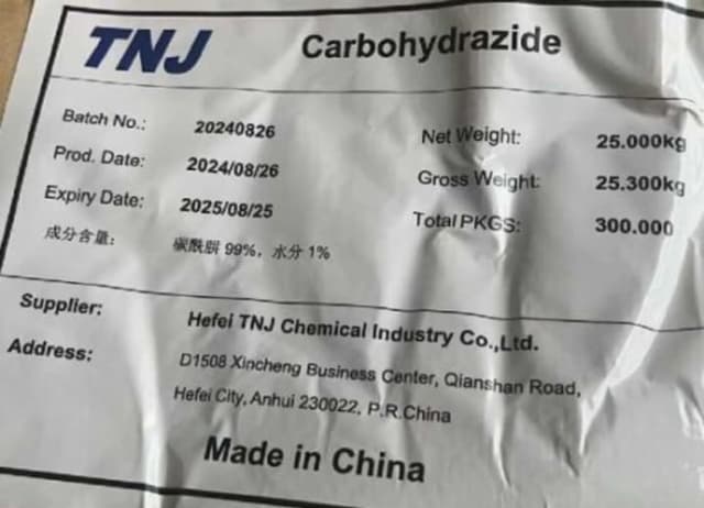 Carbohydrazide packaging showing net weight and supplier details